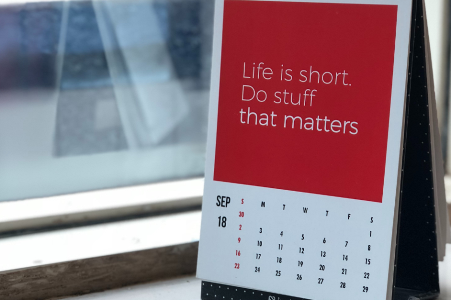 Red calendar that says life is short