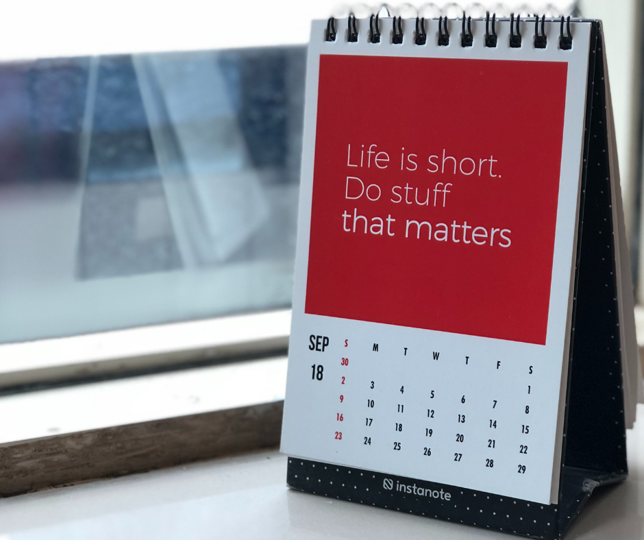 Red calendar that says life is short
