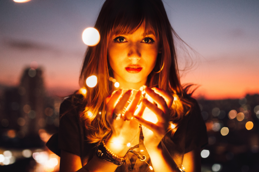 Woman seeing the light of knowledge and wisdom