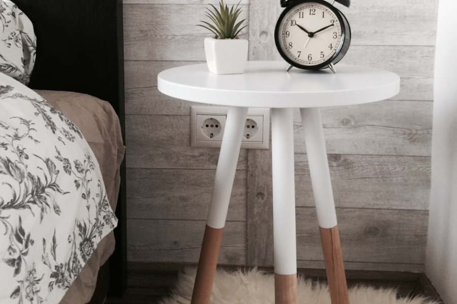 time clock on a bedside table