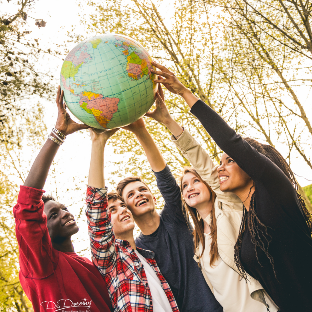 a group of people lifting a globe making the world a better place