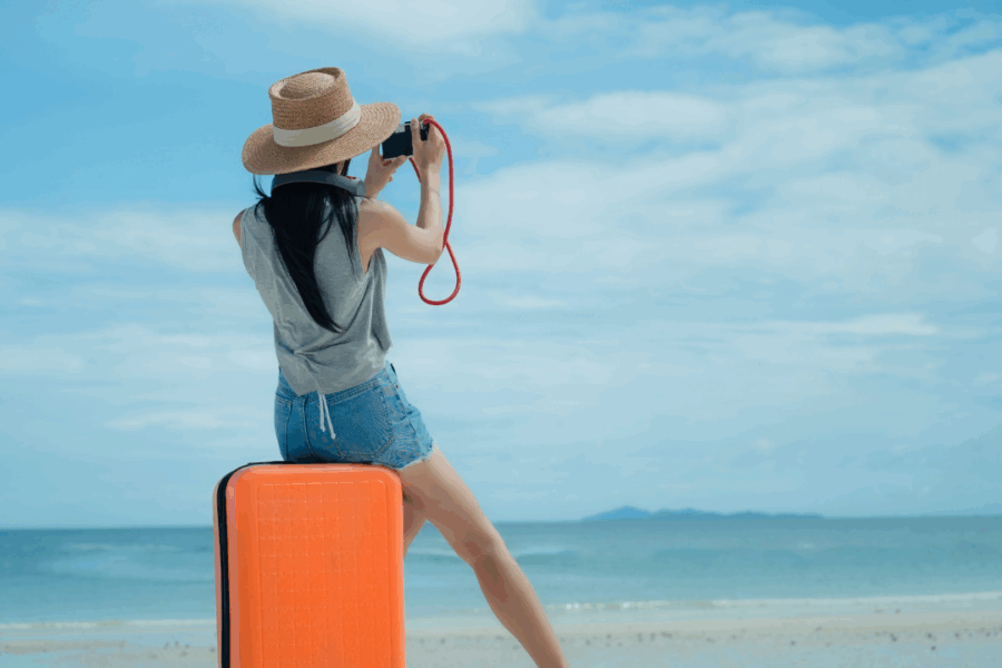 a woman at the beach on her life journey of transition