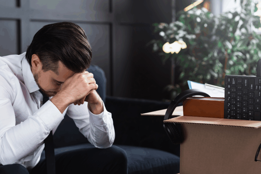 A man getting fired who is shocked